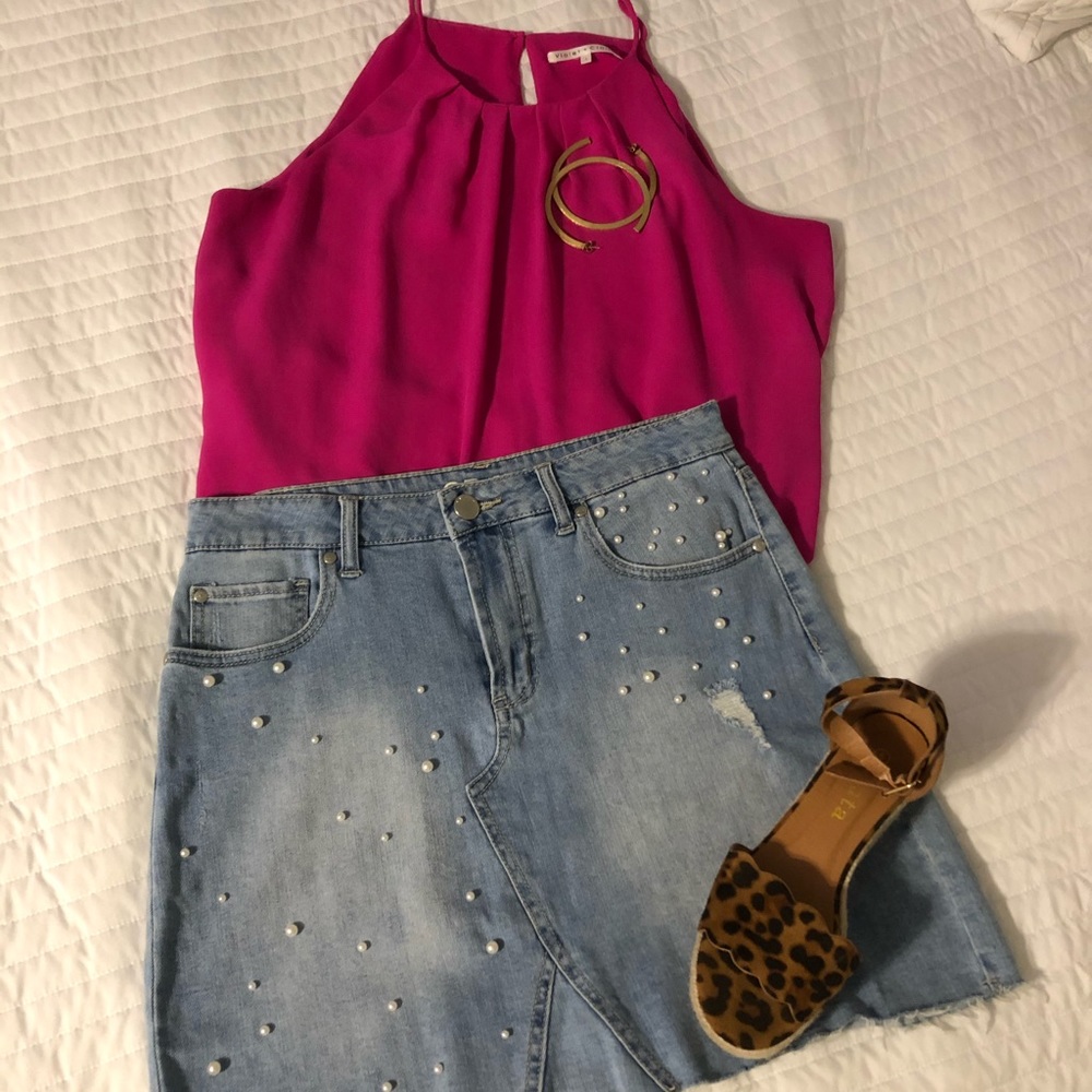 CP jeans denim mini skirt w/ pearl embellishment.